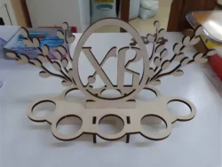 Wooden egg holder with easter branches Wooden egg holder with easter branches