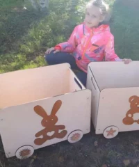 Wooden toy crate on wheel