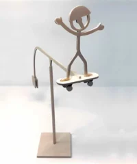 Wooden balancing skateboard guy