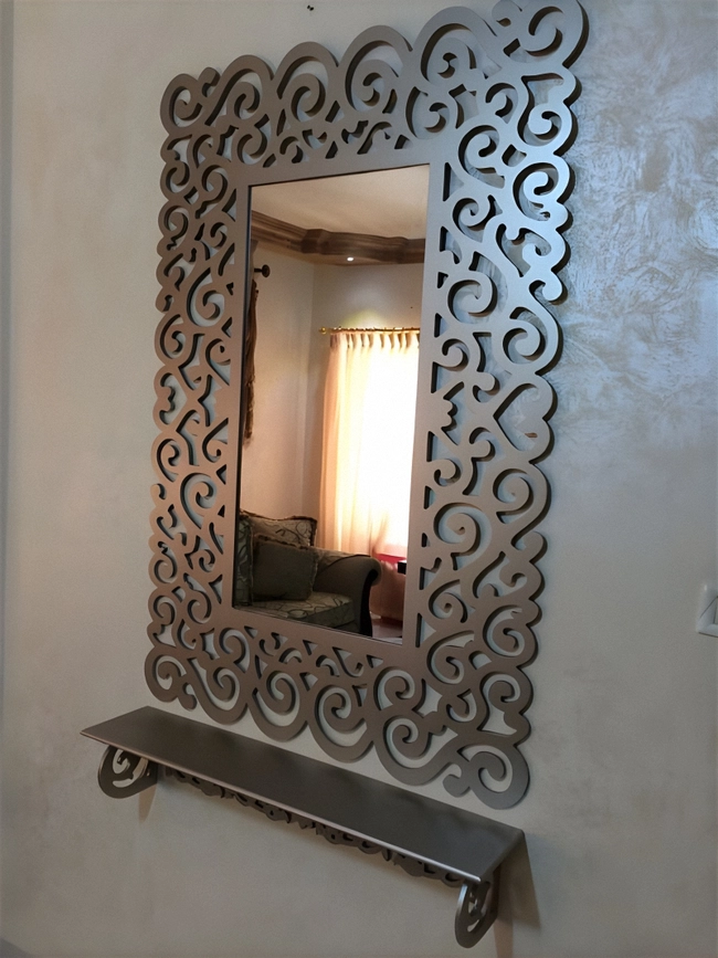 Bathroom mirror frame with shelf